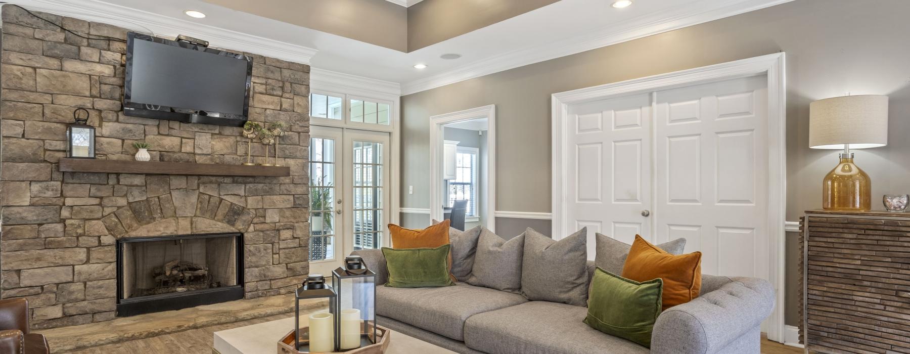 a living room with a fireplace