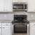 a kitchen with white cabinets